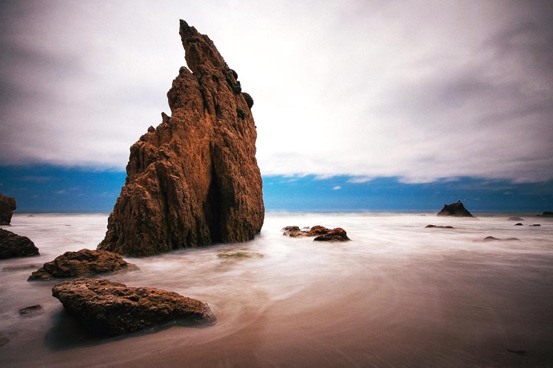 Vertical Rock Formation on Beach Vertical Rock Formation on Beach